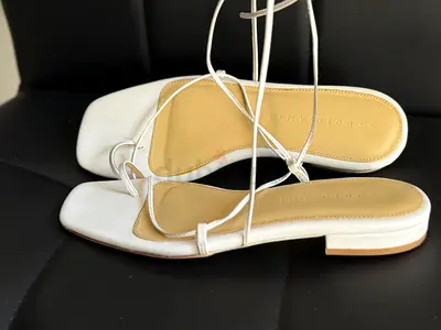 Studio Amelia strappy flat sandals with ankle ties