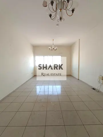 Cheapest 2-bedroom + living room apartment in Al Majaz 2 – *Free central A/C (paid by landlord) + parking included* Prime location on Gamal Abdel Nass