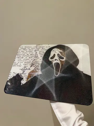 Glass mouse pad ghost face themed