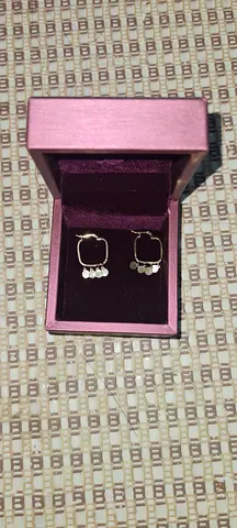 Gold-tone hoop earrings with cluster pearl/stone detail, like-new