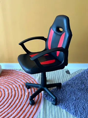 Kids black and red office chair with armrests - good condition like new