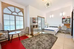 Fully Furnished 4-Bedroom + Maid Villa for Rent