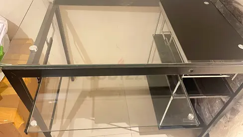 Black glass-top computer desk with side shelves - good condition