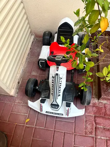 Kids Battery-Powered Ride-On Car - White/Red, Good Condition