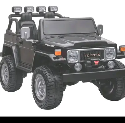 24V Toyota Premium 4x4 2- Seater Ride-On Truck W/ Rubber Wheels, Music Player &