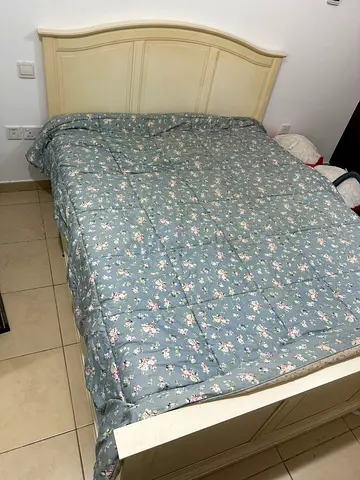 Cream double bed with mattress