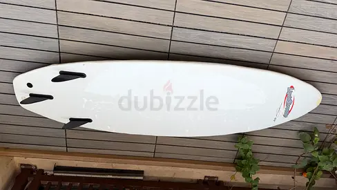 White short surfboard with three fins - good used condition
