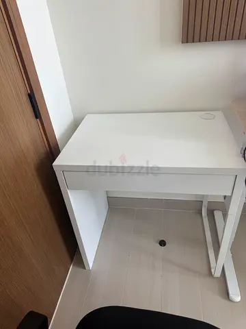 White desk with black chair / small workspace unit