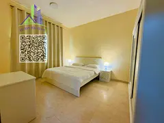 An exceptionally luxurious and upscale one-bedroom apartment with a living room, featuring brand-new