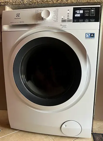 Electrolux front-load washer dryer in good working condition