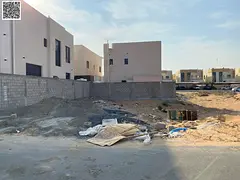 Residential land for sale in a prime location in Al Yasmin area, registration fees included.