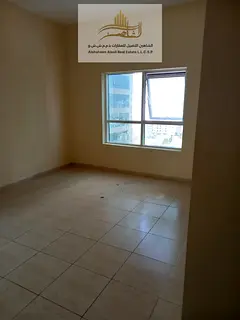 For Sale – Apartment in Ajman, Al Bustan area, Orient Towers; features a side view of Ajman Creek.