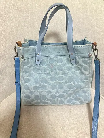 Light blue denim Coach Field tote 21 bag with detachable shoulder strap