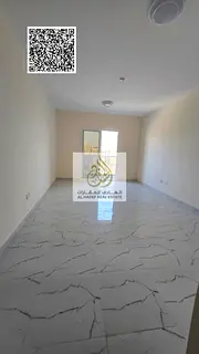 Two-bedroom apartment with a living room and a maid's room; annual rent; includes built-in wardrobes