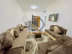 **A neatly furnished 2-bedroom apartment with a hall, inclusive of all utilities.