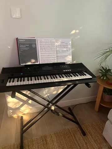 Yamaha Portable Keyboard with Stand and Music Book