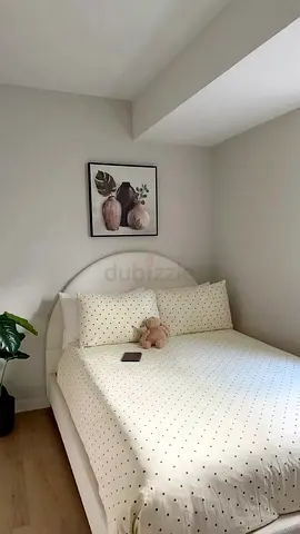 Modern White Bed with Curved Headboard