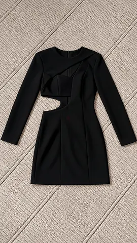 Black long-sleeve mini dress with asymmetric cut-out