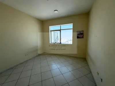 Panoramic 2-Bedroom Apartment with Distributor for Annual Rent in Al Majaz 2, Open View, Built-in Wardrobes, Free AC & 3 Bathrooms