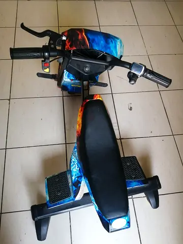 Kids Electric Ride-On Tricycle with Handlebar Controls - Used, Excellent Condition