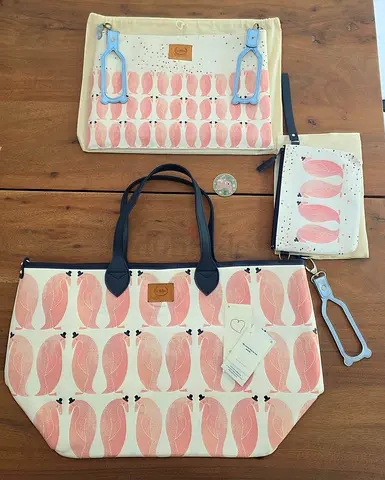 Set of floral print crossbody bag and matching pouch - gently used