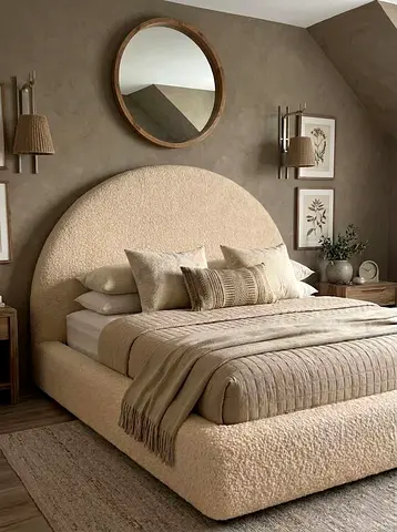 Beige upholstered bed with rounded headboard