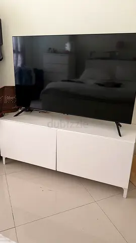 55-inch LED Smart TV in good working condition with ikea tv stand