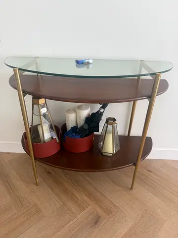 WEST ELM. Small glass-top side table with brass frame and wooden shelf