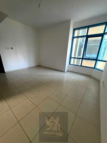 Annual Studio for Rent in Al Qasimia Al Nad A spacious studio apartment available for annual rent in Al Qasimia Al Nad, offering a large living sp