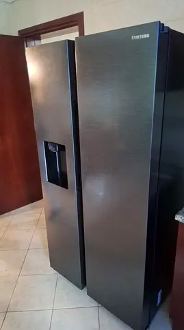 Samsung side by side refrigerator with water dispenser and ice maker