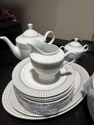 Dinner set - plates, serving plates, saucer, tea pot