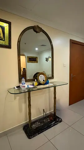 Vintage marble-base console table with large arched mirror
