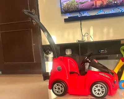 Step 2 - Red push ride-on toy car with parent handle — good condition
