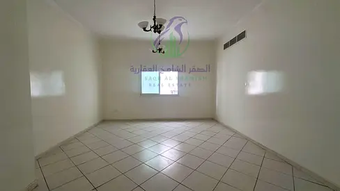 2BR apartment for annual rent in Al Majaz 3 with owner-paid contract attestation balcony with open view built-in wardrobes storage and spacious layout