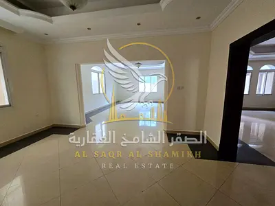 Spacious villa in Sharqan featuring 4 bedrooms (including 2 master suites 2 living rooms a separate majlis and a balcony with an open view It boa