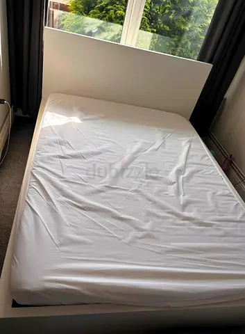 Ikea king size bed with mattress and storage drawers