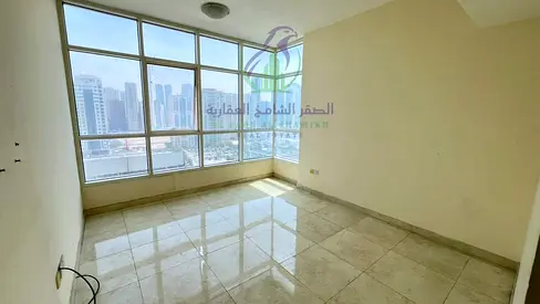 غرفتين وصالة للإيجار السنوي في التعاون على مخرج دبي مباشرة، برج جديد، غرفتين ماستر، صالة مع بلكونة وإطلالة مفتوحة، باركن مجاني