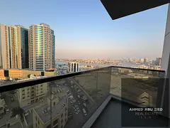 A beautiful one-bedroom apartment with a living room and balcony offering a sea view. It features tw