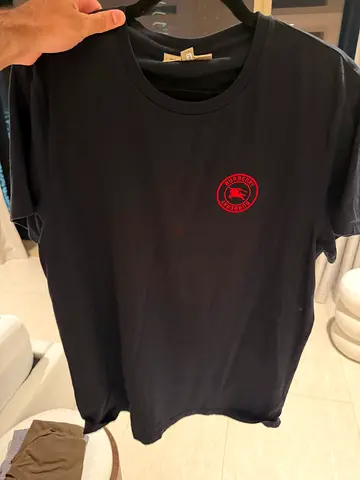 Burberry Black T Shirt, size L. Runs small.