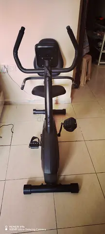 Used Upright Exercise Bike with Backrest - Good Condition