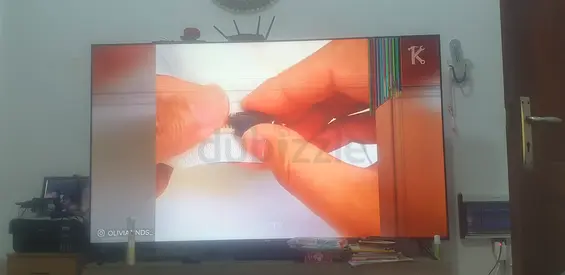 85-inch LED Smart TV - Good working condition, but with one colored damage points uo right side