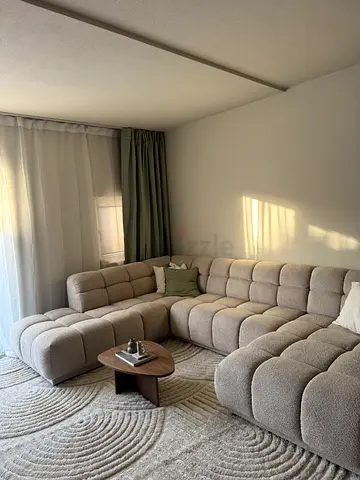 Beige tufted L-shaped modular sofa - comfortable corner set