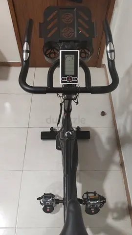 Indoor Exercise Spin Bike with LCD Console and Adjustable Resistance