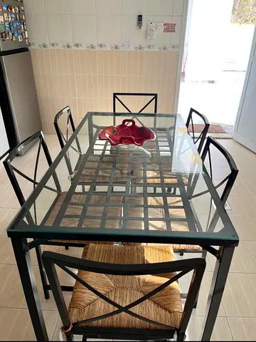 Modern dining table, black cast iron and glass, 6 chairs, very good condition