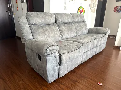 3-seater grey reclining sofa in good condition