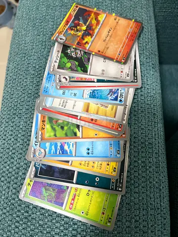 Assorted Japanese Pokémon Trading Cards - Mixed Lot with binder