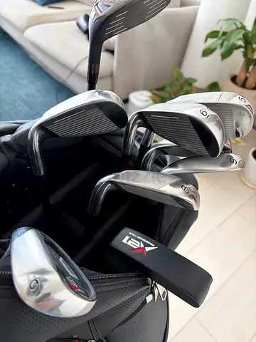 Used set of men's golf irons and woods with carry bag - good condition(6 months old and hardly used)