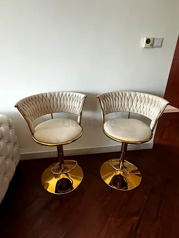 Set of 2 beige velvet swivel bar stools with gold base