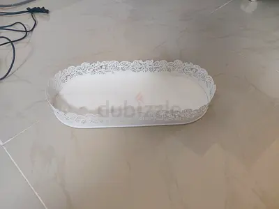 White decorative metal tray with lace edge