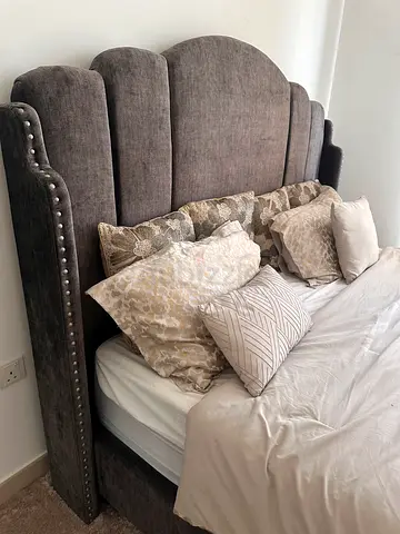 Grey upholstered queen bed frame with studded headboard exellent condition with matteress